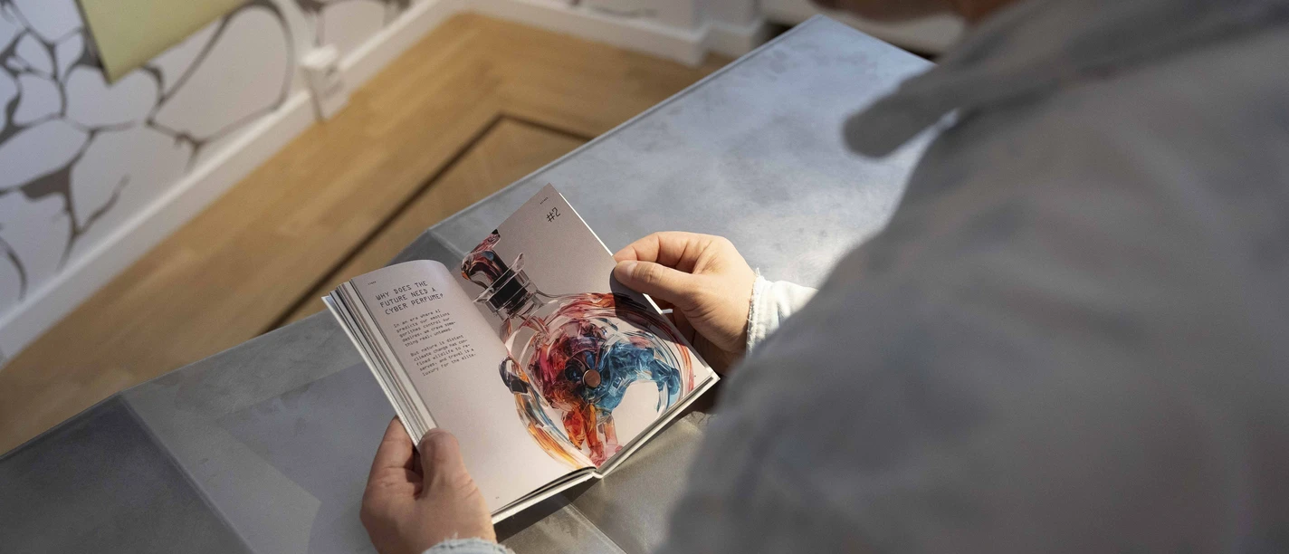 MGGU - Antiquarian Book Street Visitor reading exhibition catalogue in museum gallery