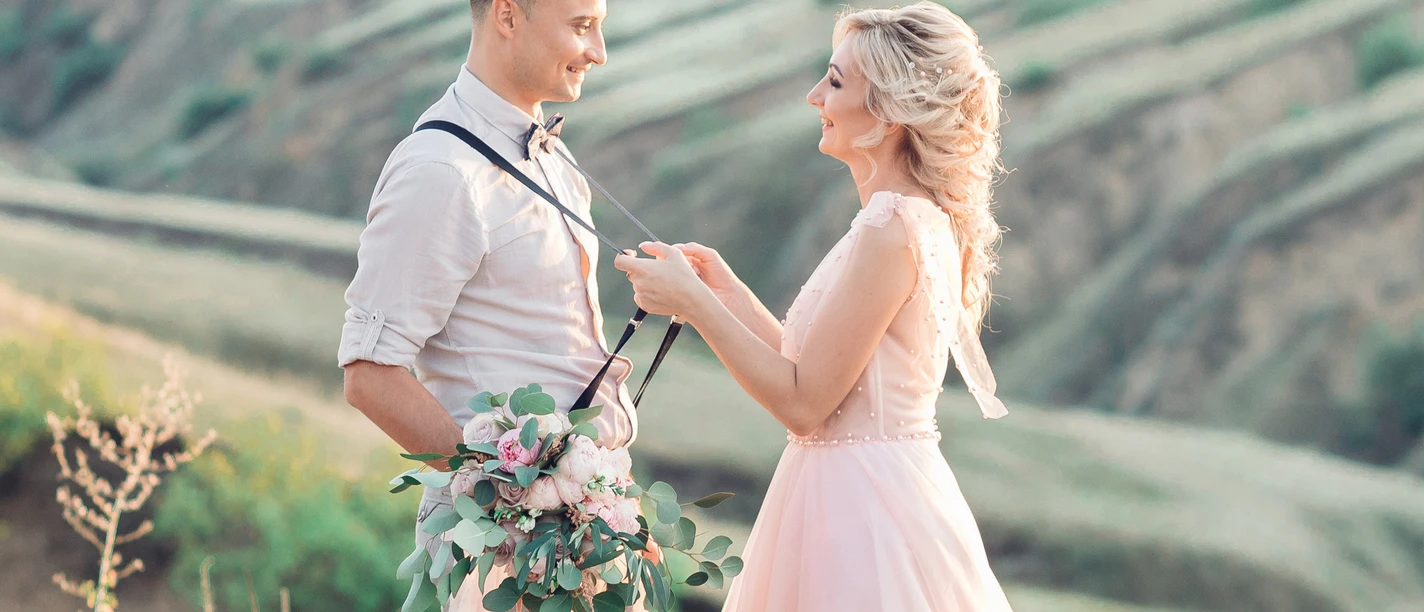 wedding couple on the nature in summer day.