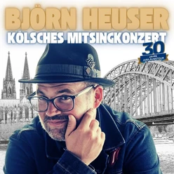 Björn Heuser vor Kölner Dom und Hohenzollernbrücke, Motiv zur 30-Jahre-Jubiläumstour