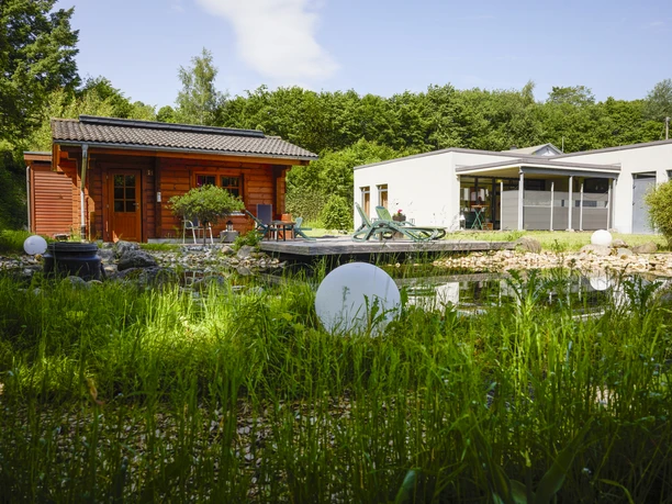 Garten der Oase und Holzsauna Haus