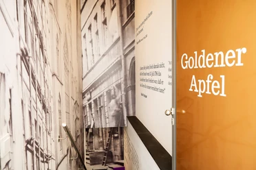 Golden Apple in Frankfurt: stairwell with text panels and handrails