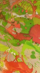 Gemaltes Bild mit den Farben orange und grün