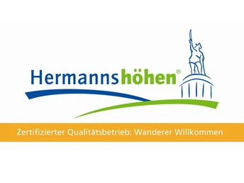 Logo der Hermannshöhen mit Bild eines Denkmals. Schriftzug: Zertifizierter Qualitätsbetrieb.