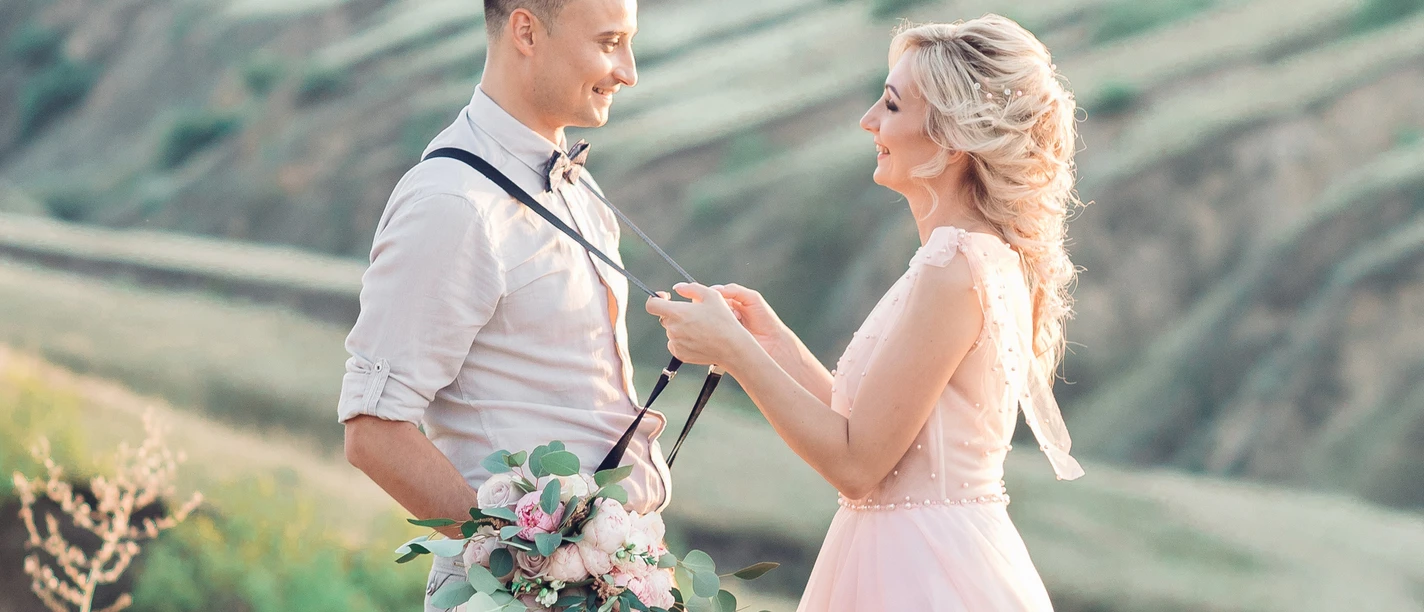 wedding couple on the nature in summer day.