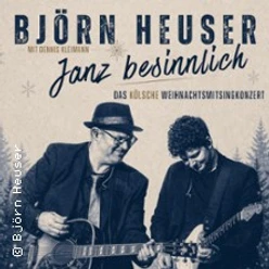 Plakat zu Björn Heuser – Janz besinnlich mit zwei Gitarristen in winterlicher Gestaltung