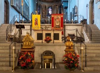 The festively decorated altar area at St. Gereon's Church during the city patron saint festivities