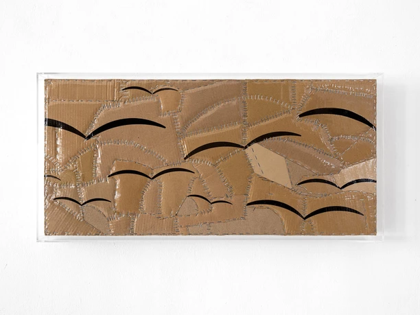 COLOAN Exhibition - Thomas Baldischwyler Abstract cardboard relief with black arches and silver seams behind acrylic glass