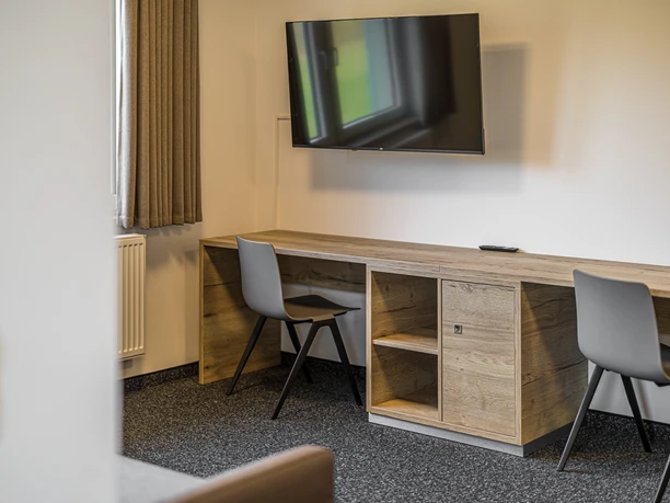 Twin room at the ‘Egidius Braun’ Sports and Conference Hotel in Leipzig | Leipzig Convention Bureau View of a Twin room at the ‘Egidius Braun’ Sports and Conference Hotel in Leipzig – presented by Leipzig Convention Bureau
