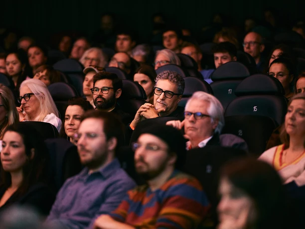FILM FESTIVAL COLOGNE An engrossed audience in the theater during the Cologne Film Festival awards ceremony