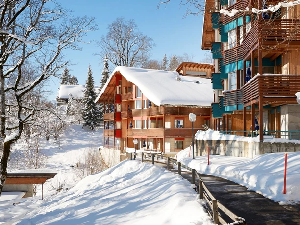 Exterior view in winter - Reka Holiday Village Hasliberg reka-holiday-village, hasliberg, bernese-oberland Exterior view in winter - Reka Holiday Village Hasliberg reka-holiday-village, hasliberg, bernese-oberland