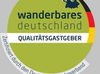 Gütesiegel Qualitätsgastgeber Wanderbares Deutschland Das Gütesiegel "Wanderbares Deutschland" signalisiert zertifizierte Qualität für wanderfreundliche Gastgeber.