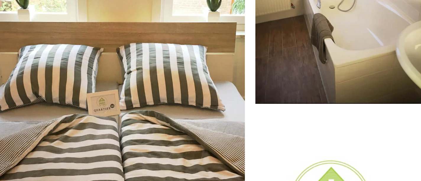 Doppelbett mit gestreifter Bettwäsche in hellem Raum, daneben Badezimmer mit moderner Badewanne.