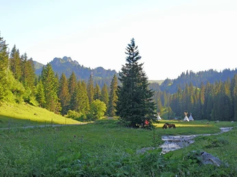 The Tipicamp by the stream