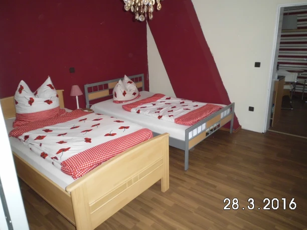 dreibettzimmer