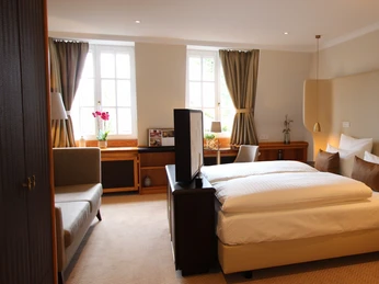 Ein "Boutiquezimmer" im Landhaus Wachtelhof Ein "Boutiquezimmer" im Landhaus WachtelhofA "boutique room" in the Landhaus WachtelhofEt "boutique-værelse" på Landhaus WachtelhofEen "boetiekkamer" bij Landhaus Wachtelhof