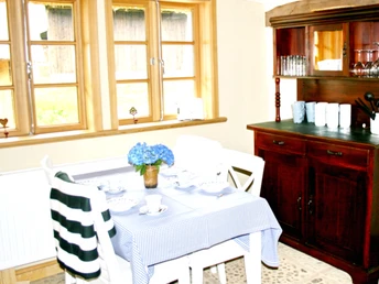 Kleiner Essplatz im Oste-FerienhofSmall dining area in the Oste-FerienhofLille spiseplads i Oste-FerienhofKleine eethoek in de Oste-Ferienhof