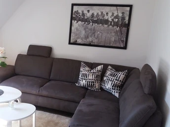 Leefruimte in de woonkamer van de vakantiewoning Brunnenstraße