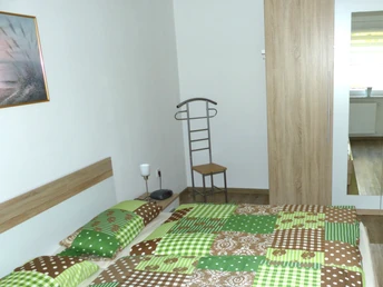 Schlafzimmer mit Doppelbett in der Ferienwohnung Brandt Schlafzimmer mit Doppelbett in der Ferienwohnung Brandt