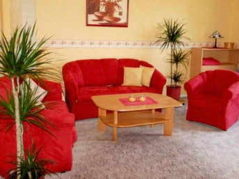 Das Wohnzimmer in der Ferienwohnung des Mühlenhofs