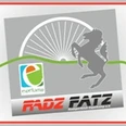 Logo von Radzfatz: Ein springendes Pferd mit Rad im Hintergrund, begleitet von einem Stadtplan.
