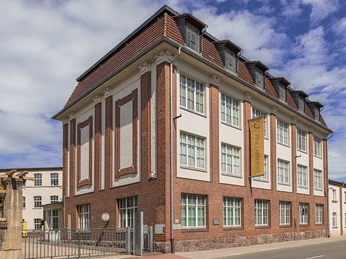 Außenansicht der Tuchfabrik Gebr. Pfau