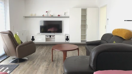 Woonkamer met TV in de vakantiewoning Trautchen