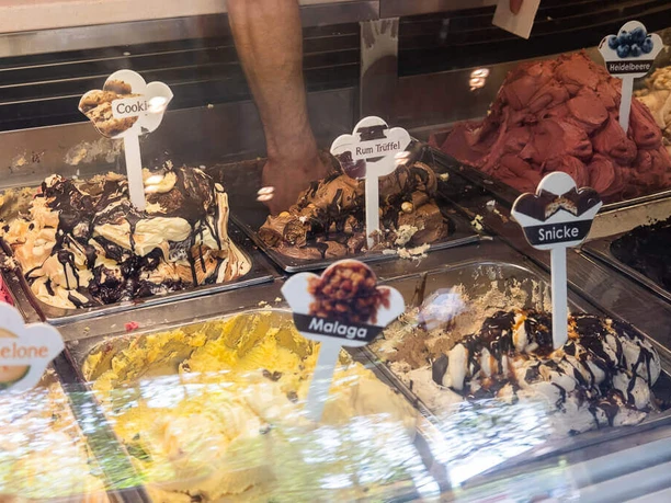 Breda Ice Cream Café Ice cream display case with a wide selection of ice creams.