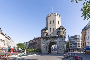 Severinstorburg Severinstorburg in Cologne: Historic city gate with a central tower and flanking towers.