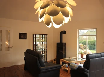 Wohnzimmer mit Kaminofen Wohnzimmer mit Kaminofen