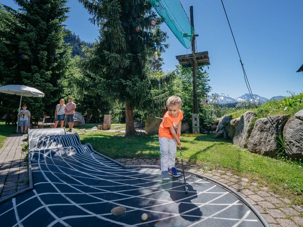 No one too small to be a minigolfer No one too small to be a minigolfer