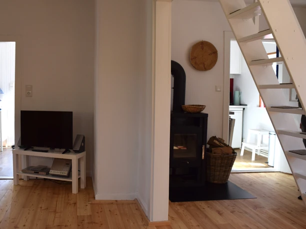 Offener Wohnbereich im Ferienhaus Backhaus Heinschenwalde Offener Wohnbereich im Ferienhaus Backhaus Heinschenwalde