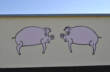 Fleischerei Neubauer Wandbild von Schweinen