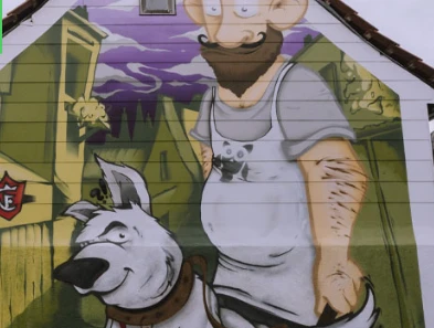 Street-Art-Spot relating to the story of Till Eulenspiegel. Street-Art-Spot nach der Geschichte um Till Eulenspiegel.Street-Art-Spot relating to the story of Till Eulenspiegel.Street art-reklame baseret på historien om Till Eulenspiegel.Street art advertentie gebaseerd op het verhaal van Till Eulenspiegel.