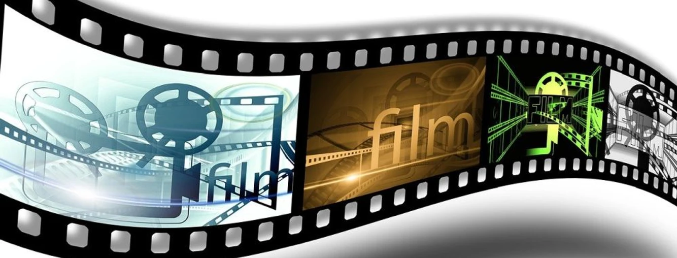 Kino.jpg Grafische Filmrolle mit bunten Bildern und Schriftzügen, die Kinostimmung und Filmkultur symbolisieren.