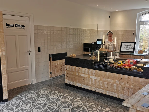 Rücker Käsehaus Innenansicht mit Theke Rücker Käsehaus Aurich Innenansicht mit Theke