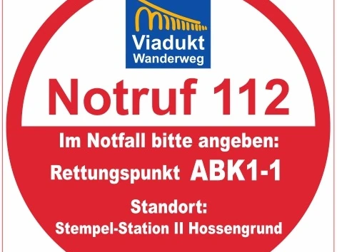 Rundes Notruf-Schild für den Viadukt-Wanderweg mit Rettungspunkt ABK1-1 und Standortangabe.