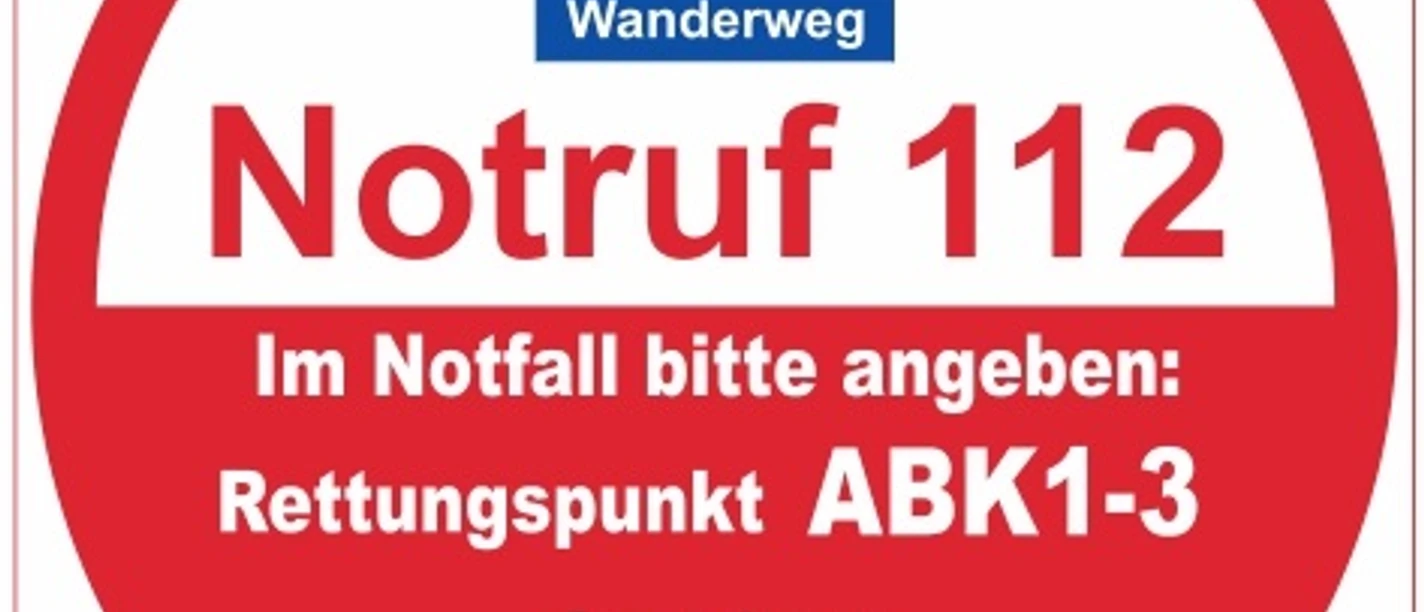 Rettungspunkt ABK1-3 Runder Notfallhinweis mit Rettungspunkt ABK1-3 am Viadukt Wanderweg, Standpunkt Buker Bahnhof.