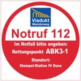 Rettungspunkt ABK3-1 Runder Notfallhinweis der Viadukt Wanderweg mit Notrufnummer 112 und Rettungspunkt ABK3-1.