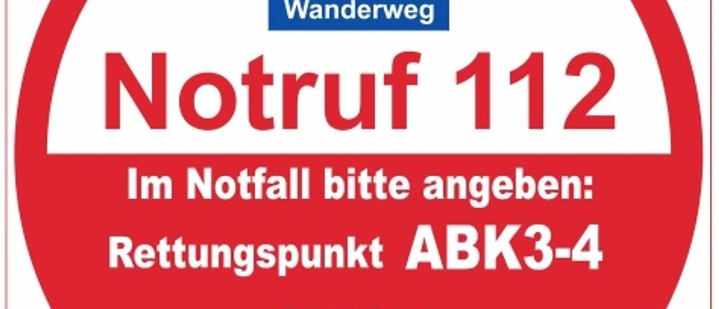Rettungspunkt ABK3-4 Rettungspunkt ABK3-4 auf rotem Schild, bietet Notrufhilfe am Viadukt Wanderweg, Standort Parkplatz Durbeke.