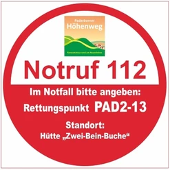Roter Notruf-Hinweis Paderborner Höhenweg, PAD 2-13, für schnelle Hilfe in Notfällen.
