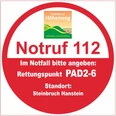 Rettungspunkt PAD2-6 Runder Rettungspunkt PAD2-6 Schild bei Steinbruch Hanstein mit Notruf 112 Hinweis im Paderborner Höhenweg.