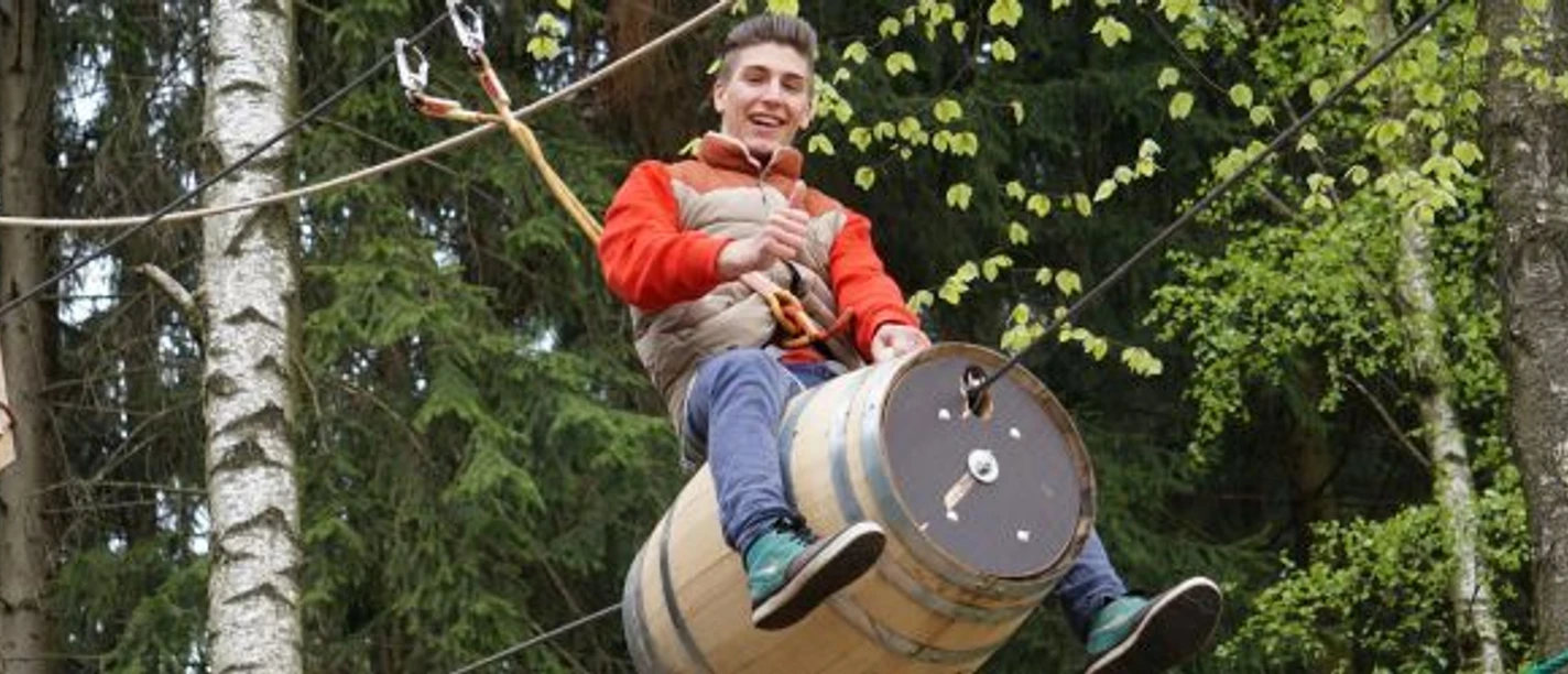Fassrutsche im Kletterwald Fassrutsche im Kletterwald
