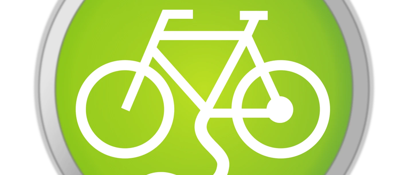 pixabay-e-bike-4259439.png Symbol für eine Fahrradladestation: Ein weißes Fahrrad mit Stecker auf grünem Hintergrund in einem Kreis.