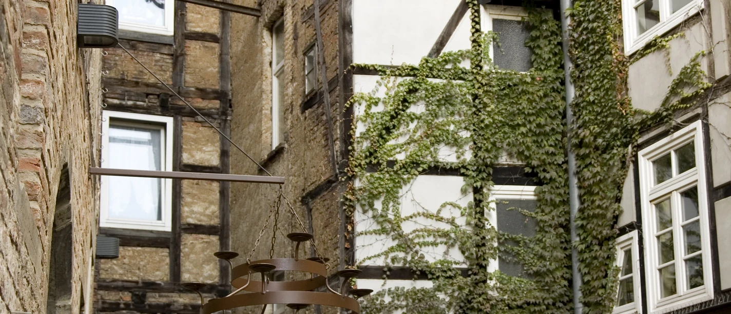 Minden - Hofviertel.jpg Das Bild zeigt das sogenannte Hofviertel, ein "Hinterhof" am Marktplatz.