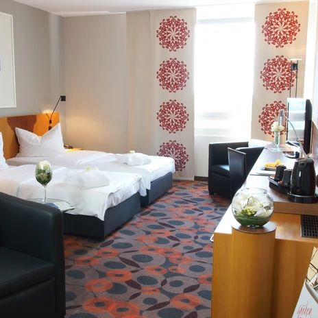 Interior view of the hotel room with double bed, armchair and other interior furnishings, accommodation, vacation, short break
