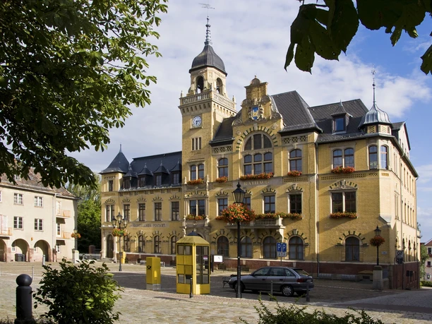 View of the beautifully restored Bad Lausick town hall with gabled tower and clinker facade, Sights, Culture, Excursion
