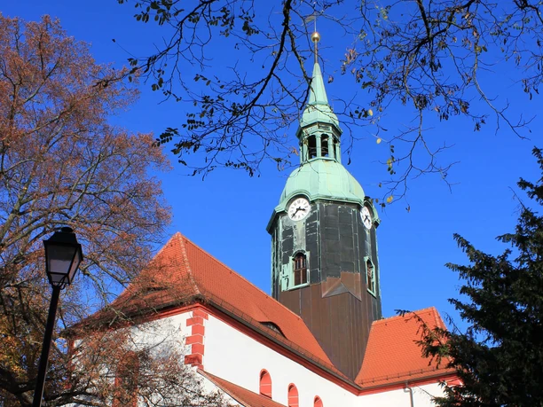 View of the imposing St. Kilian's Church in Bad Lausick against a blue sky, Sights, Culture, Religion