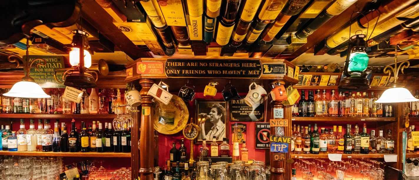 Photograph of the Noels Ballroom and the range of drinks and decorations behind the bar