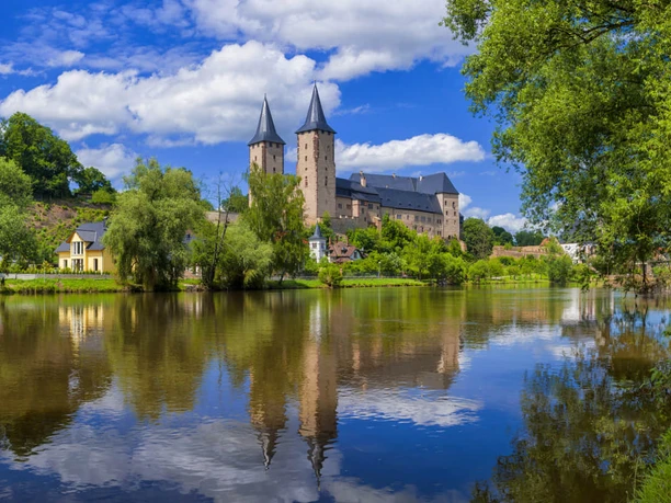 General view of Rochlitz Castle with the River Mulde in the foreground, Mulde Cycle Route, Luther Trail Saxony