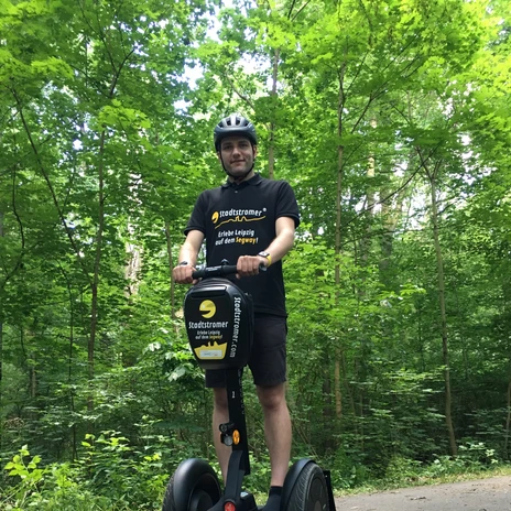 Stadtstromer Segwaytour - Experience providers in Leipzig View of a man on a Segway taking a city tour with the Stadtstromer experience provider